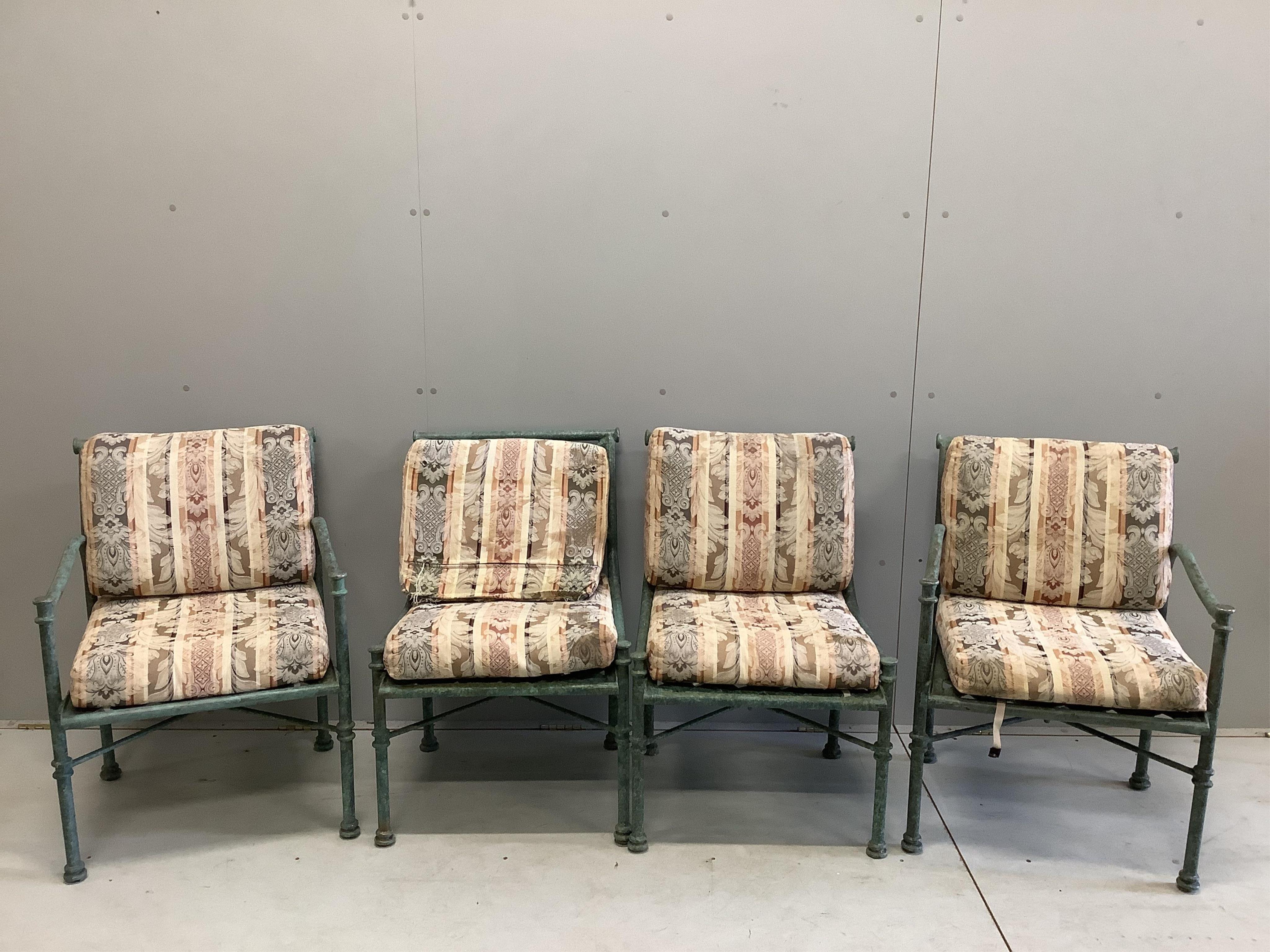 A set of four painted aluminium conservatory armchairs with cushion seats and backs, width 55cm, depth 47cm, height 80cm. Condition - fair